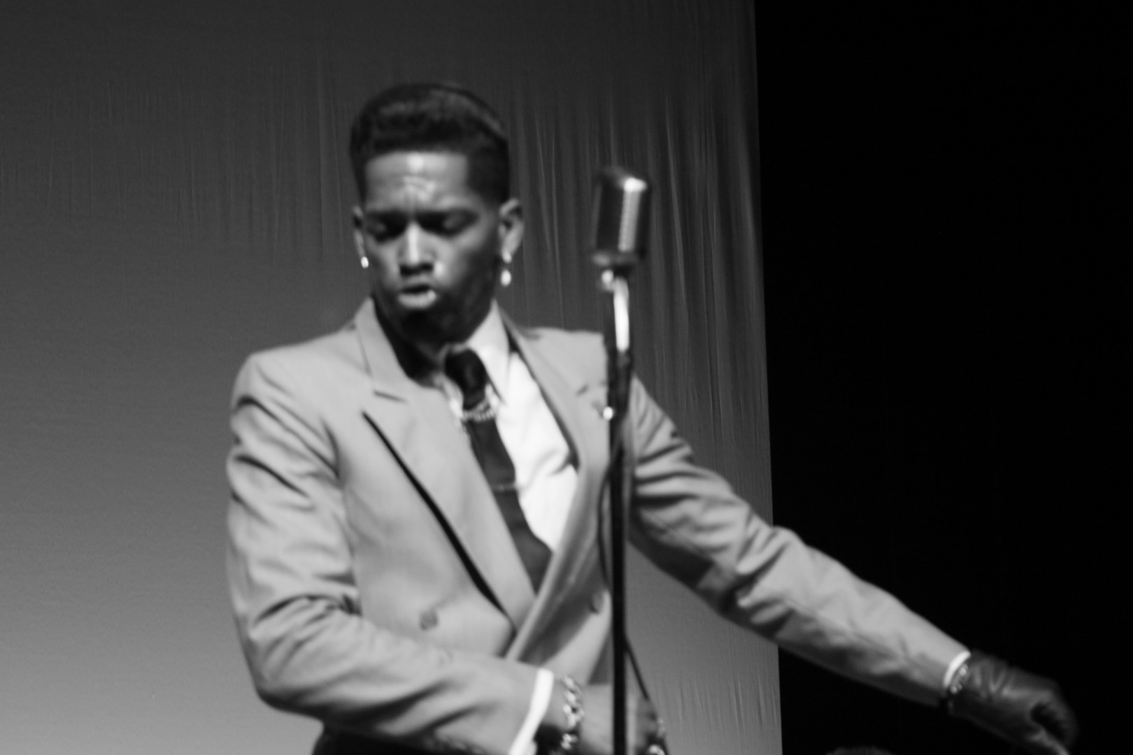 Singer at vintage microphone