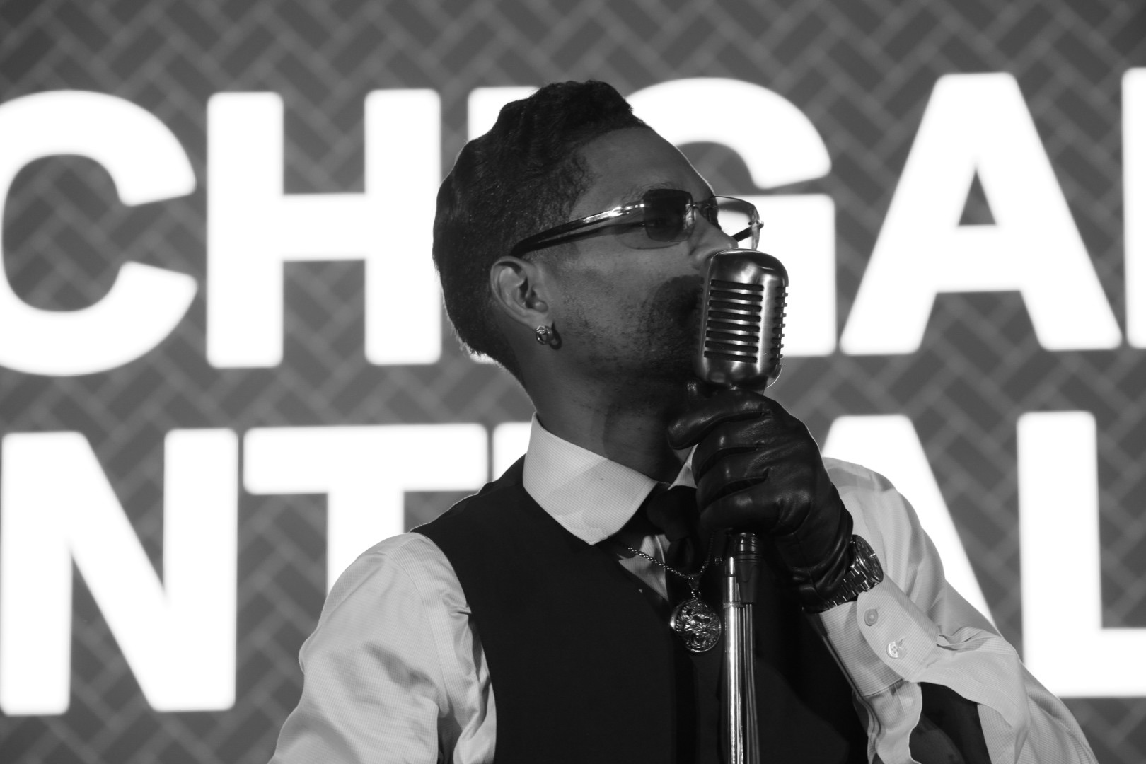 Lead vocalist performing at Michigan Central